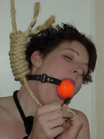 Crystal Hanging While Ballgagged