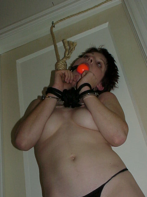 Crystal Hanging While Ballgagged