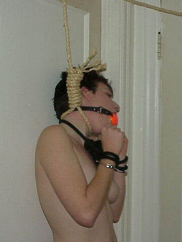 Crystal Hanging While Ballgagged