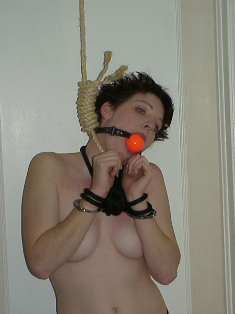 Crystal Hanging While Ballgagged